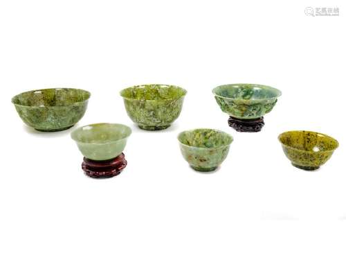 Six Chinese Spinach Jade Bowls each with rounded walls