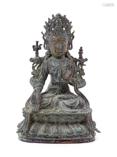 A Chinese Bronze Figure of Guanyin the deity depicted