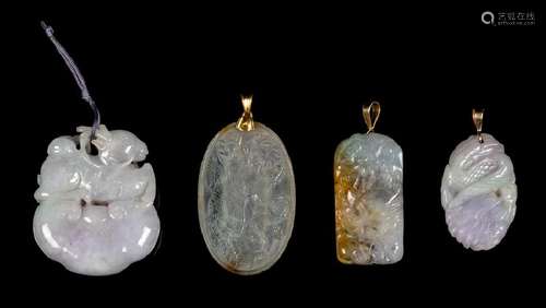 Four Chinese Jadeite Pendants the first a translucent