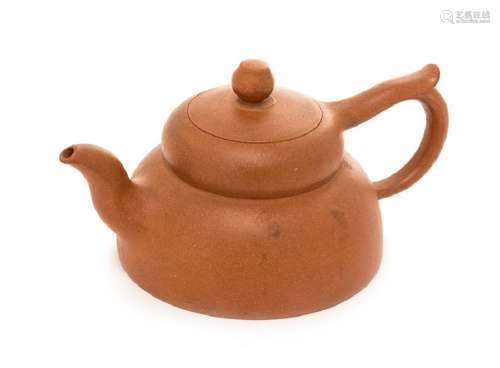 A Chinese Yixing Pottery Teapot 20TH CENTURY molded in