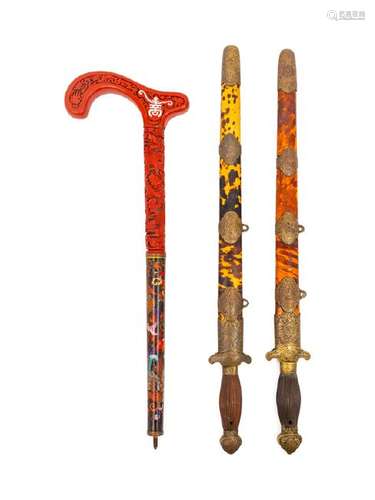 A Group of Two Chinese Swords and One Walking Cane