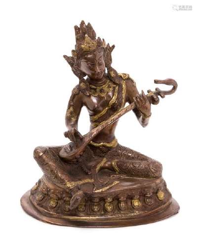 A Sino-Tibetan Parcel Gilt Bronze Figure of a Seated