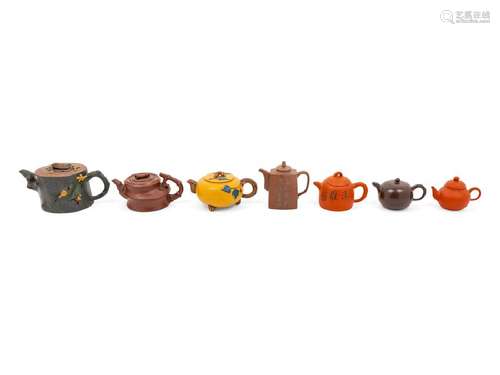 A Group of Seven Chinese Yixing Teapots comprising one