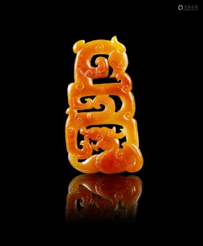 A Chinese Russet and White Jade Reticulated Pendant