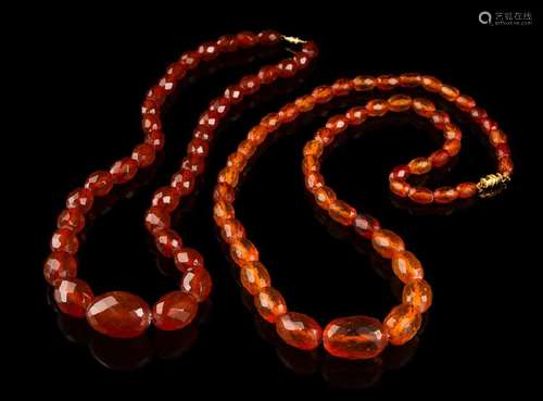 Two Chinese Amber Beaded Necklaces 20TH CENTURY each