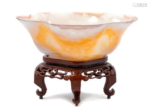 A Chinese Agate Bowl finely carved with a lobed rim,