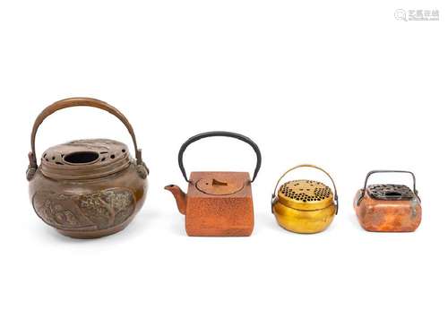 A Group of Four Chinese Hand Warmers and Teapot 20TH