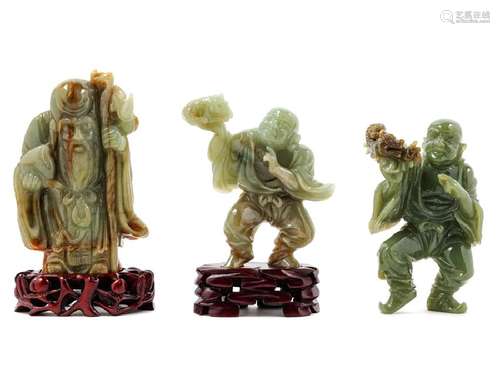 Three Chinese Celadon Jade Figures 20TH CENTURY showing