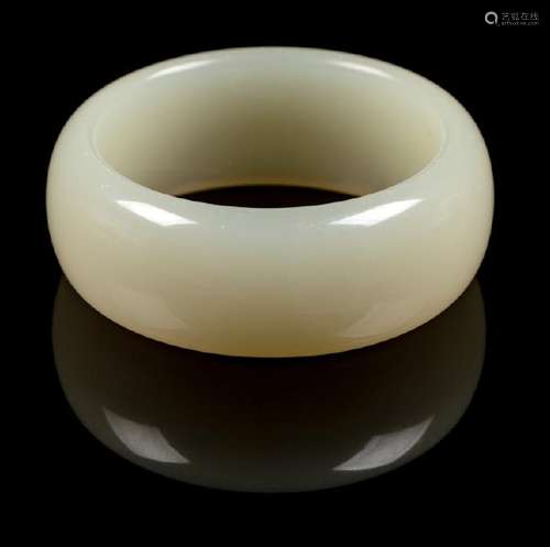 A Chinese White Hardstone Bangle of semi-cylindrical