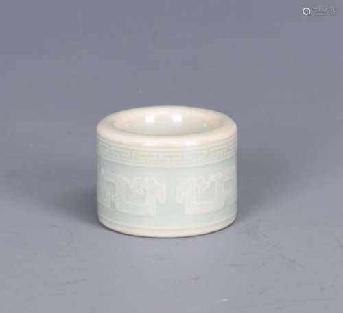 A CHINESE CELADON GLAZED ARCHER'S RING, 18TH CENTURY