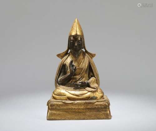 A CHINESE GILT BRONZE FIGURE OF TSONGKHAPA, 18TH