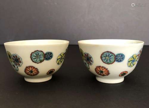 A RARE PAIR OF CHINESED DOUCAI CUPS, YONGZHENG MARK