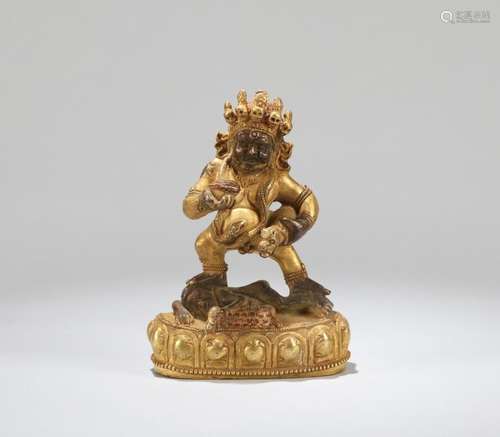 A CHINESE GILT BRONZE FIGURE OF JAMBHALA, 18TH CENTURY