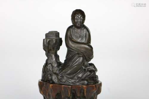 A CHINESE AGARWOOD FIGURE