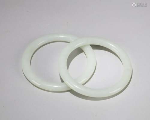 A PAIR OF CHINESE WHITE JADE BANGLES, QING DYNASTY