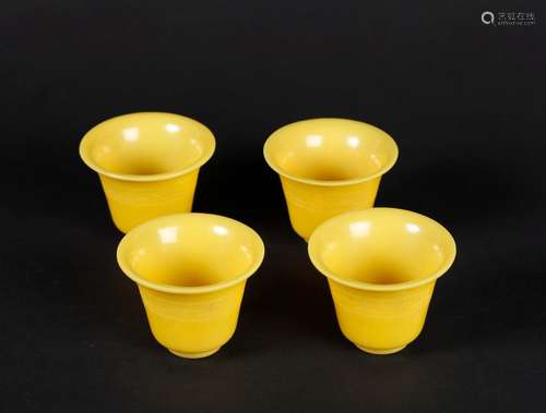 FOUR CHINESE YELLOW PEKING GLASS CUPS, QING DYNASTY