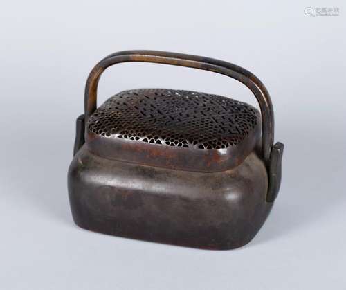 A CHINESE BRONZE HAND WARMER, QING DYNASTY