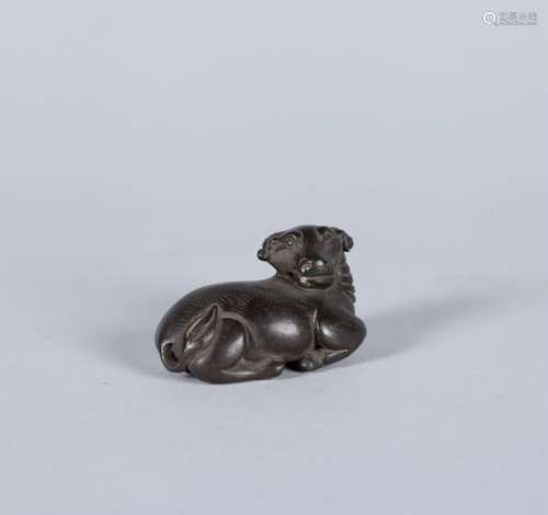 A CHINESE BRONZE WATER BUFFALO, QING DYNASTY