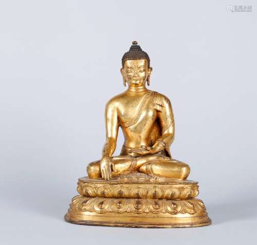 A CHINESE GILT BRONZE FIGURE OF BUDDHA, 18TH CENTURY