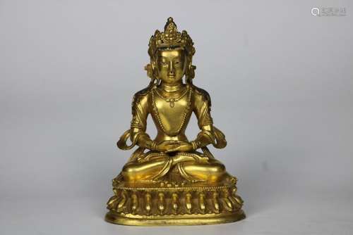 A CHINESE GILT BRONZE FIGURE OF BUDDHA, 18TH CENTURY