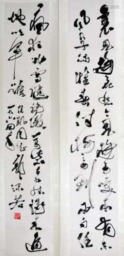 A CHINESE CALLIGRAPHY COUPLETS, AFTER GUO MORUO, INK ON