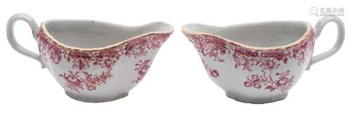 A pair of Chinese export 'camaieu rose' sauce boats: painted with floral sprays and foliage,