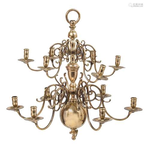 A 19th century brass twelve-branch chandelier in the Dutch style: with a knop and ball central stem