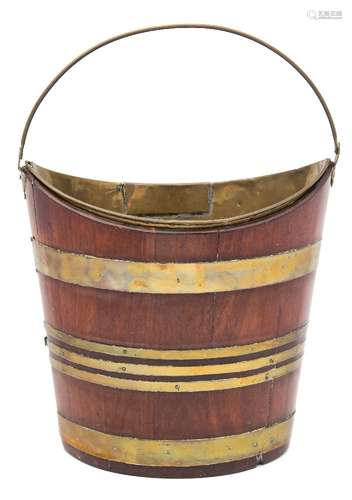 An 18th century mahogany and brass bound navette shaped bucket: of coopered construction,