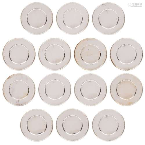 A set of fourteen 20th century German sterling silver dinner plates, maker Jakob Grimminger,