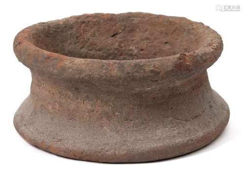 An Egyptian pottery jar support: of circular form 18cm diameter.