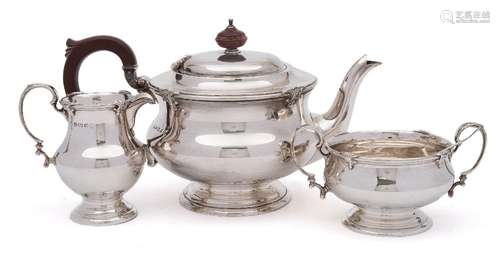 A George V silver three-piece tea service, maker Adie Brothers Ltd, Birmingham,