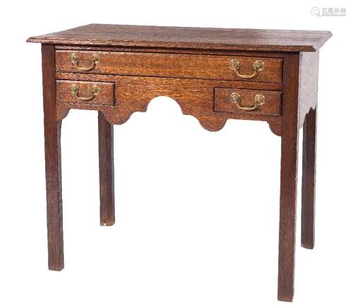 An early 19th Century oak rectangular side table:, the top with a moulded edge,