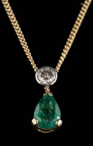 An emerald and diamond two-stone pendant: the round brilliant-cut diamond estimated to weigh 0.