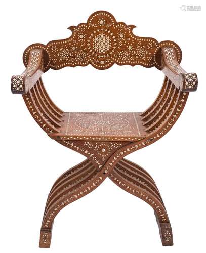 An Anglo-Indian hardwood and ivory and bone inlaid curved X-frame armchair:,