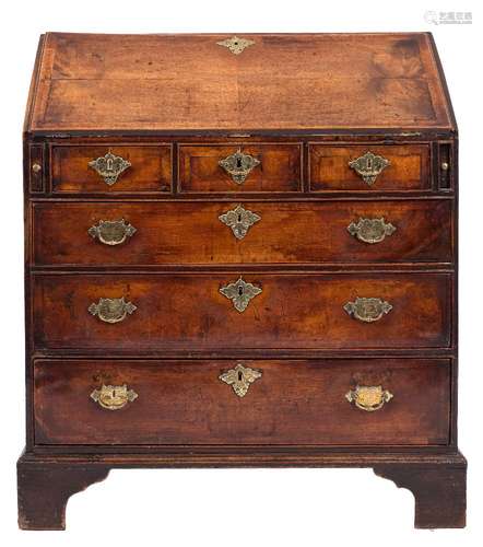 An early 18th Century walnut and fruitwood bureau:,