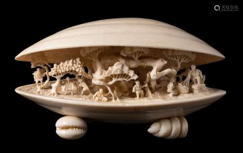 An early 20th century Japanese ivory okimono,