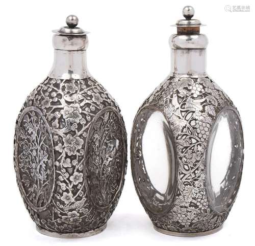 A pair of early 20th century Chinese silver mounted Dimple Haigh whiskey bottles,