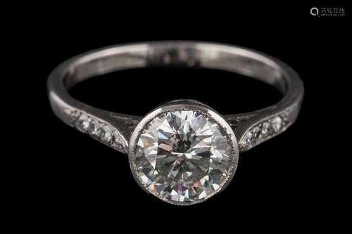 A diamond single-stone ring: the round brilliant-cut diamond approximately 7.5mm diameter x 4.