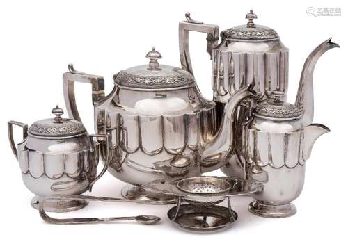 An Indian silver four-piece tea and coffee service, unmarked: of lobed oval outline,