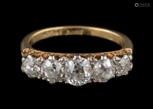 A graduated diamond five-stone ring: with cushion-shaped,