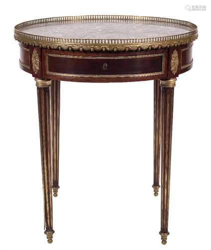 A French Empire mahogany and gilt metal mounted circular centre table:,