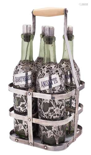 A late 19th/early 20th century French silver four-bottle tantalus: of rectangular outline with