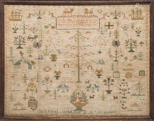 An early 19th century sampler: with central verse enclosed by assorted motifs of flowering bushes,