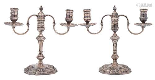 A pair of Elizabeth II silver twin branch candelabra, maker Nayler Brothers, London,