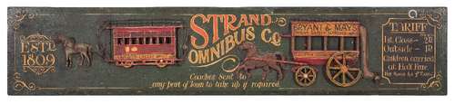 A 20th century Strand Omnibus Co painted and carved wood sign:, 41 x 222cm.