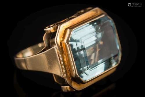 A rectangular aquamarine single-stone ring: the rectangular aquamarine approximately 18mm long x