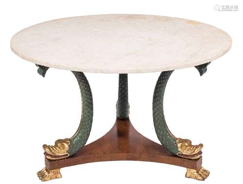 A carved and decorated wood circular centre table in the Regency taste:,