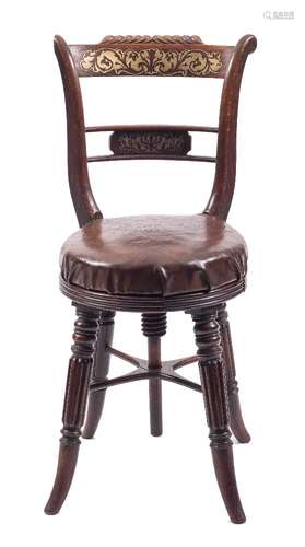 A Regency rosewood, simulated and brass inlaid harpists revolving chair:,