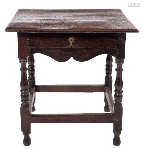 An oak rectangular side table:, with an overhanging top,