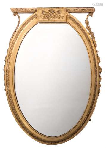 An oval giltwood and gesso overmantel mirror:,